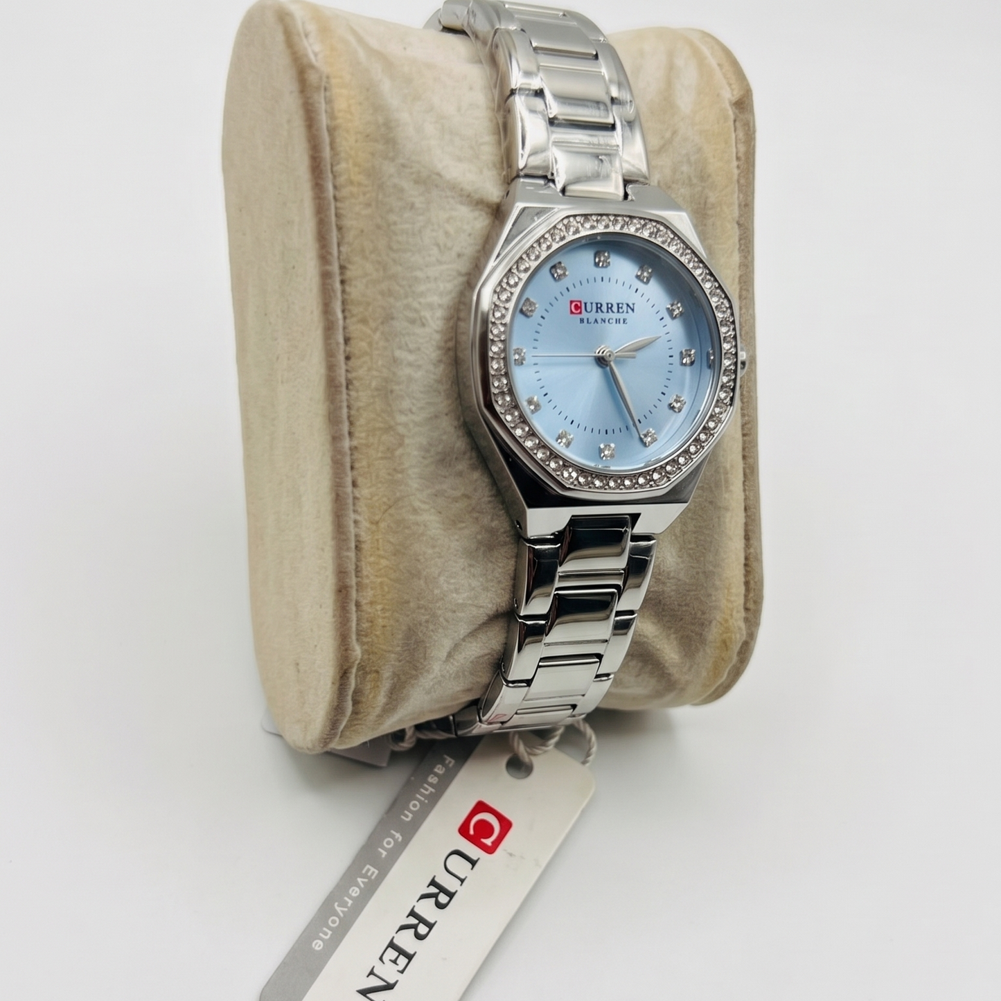 CURREN Blanche Luxury Women's Watch – Silver Stainless Steel Band with Rhinestone Bezel and Ice Blue Dial