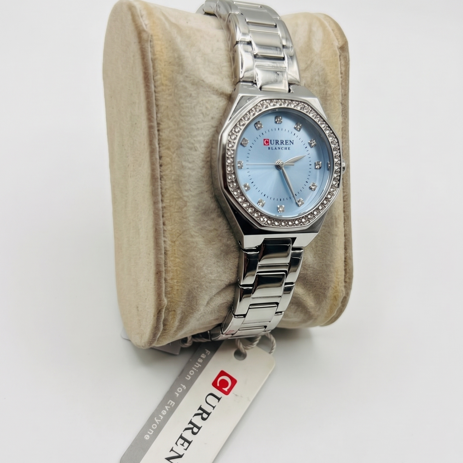 CURREN Blanche Luxury Women's Watch – Silver Stainless Steel Band with Rhinestone Bezel and Ice Blue Dial
